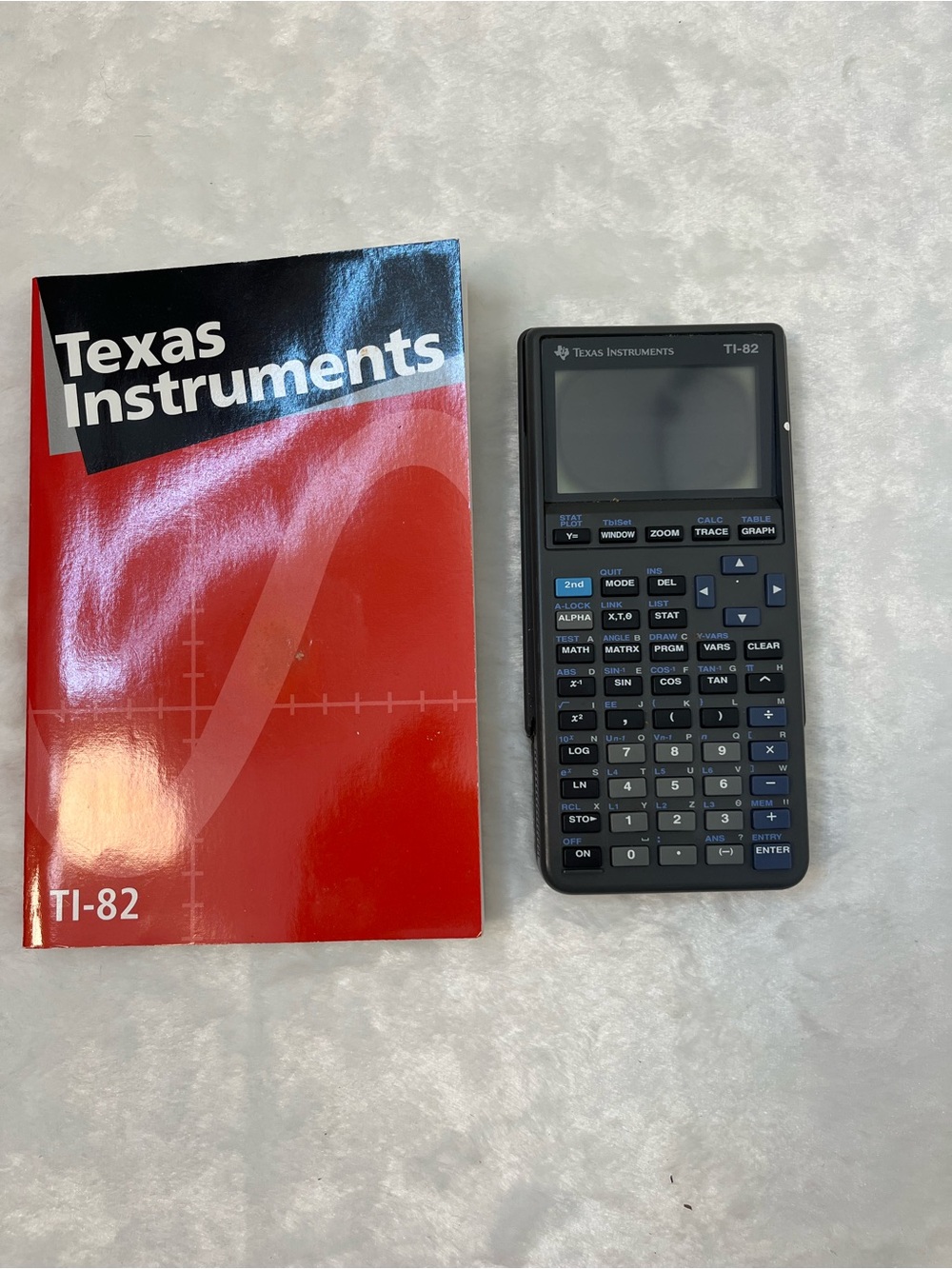 Texas Instruments TI-82 Graphing Calculator w/ Manual **Tested